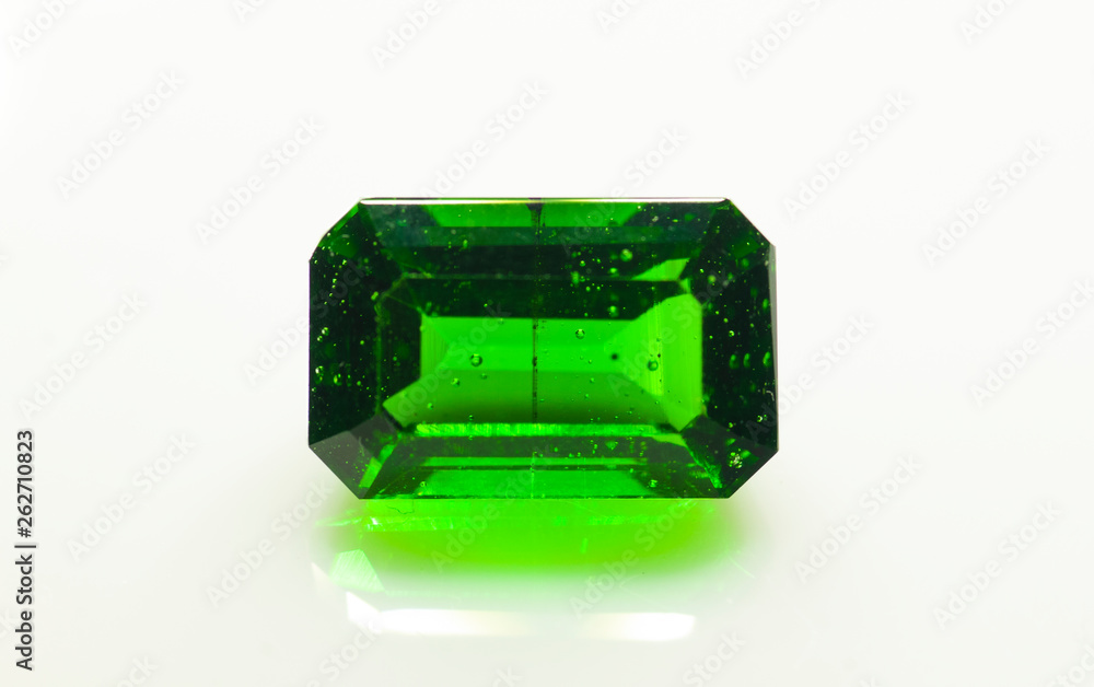 Natural green moldavite on the white background Natural green moldavite on the white background