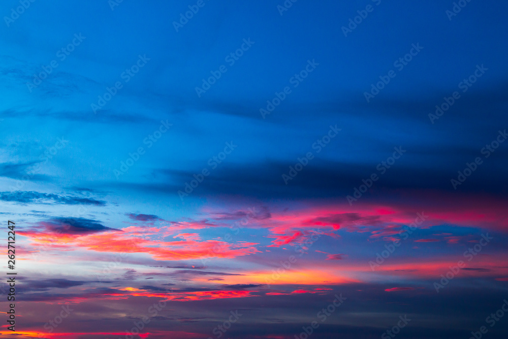 .colorful dramatic sky with cloud at sunset.