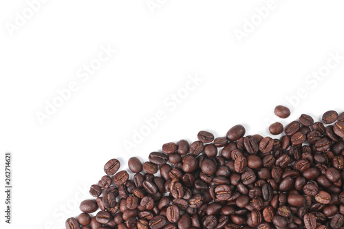 Roasted coffee beans, dark Roast coffee background. Closeup top view pile of coffee beans on white background, space for text