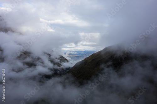 Mystical clouds opening a small window at the Salkantay Trek to Machu Pichu, Peru