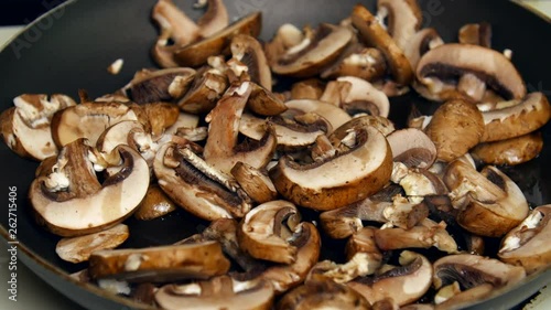 Time lapse of mushrooms cooking on the stove. photo