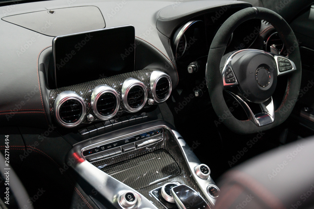 Dashboard and instrument panel, steering wheel in the sport racing car