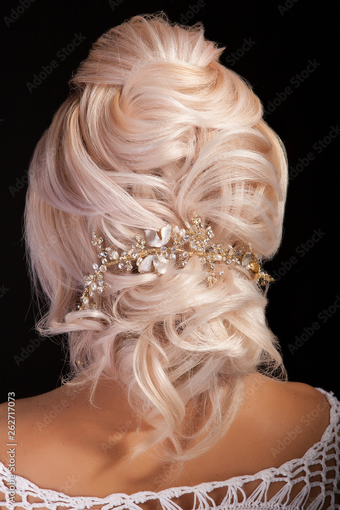 Portrait of young beautiful woman with elegant coiffure