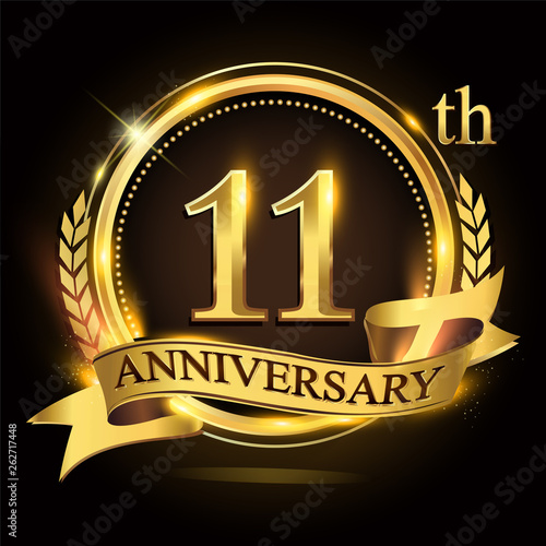 11th golden anniversary logo with ring and ribbon, laurel wreath vector design.