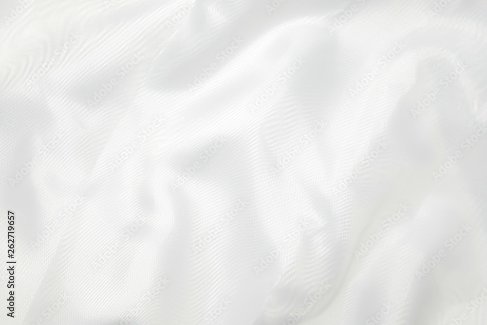 White cloth background abstract with soft waves.