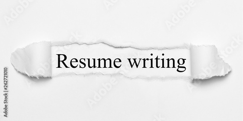 Resume writing on white torn paper