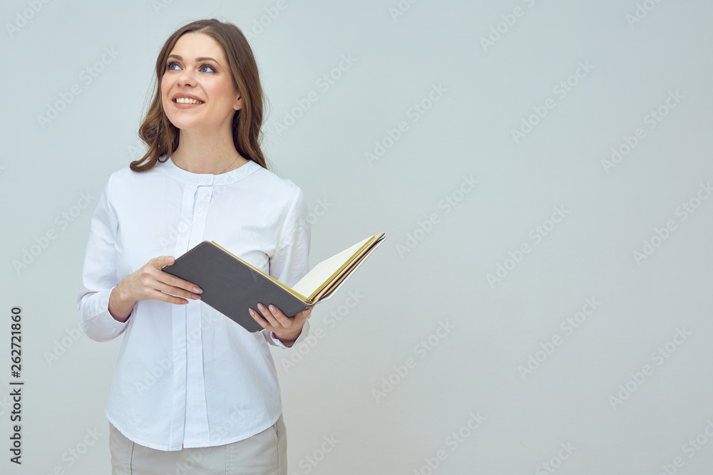 woman teacher or businesswoman holding book. woman teacher or businesswoman holding book.