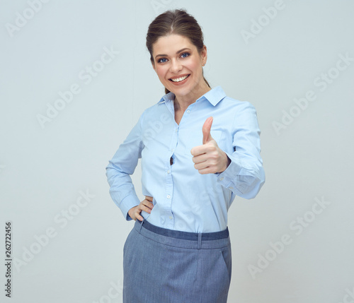 happy business woman shows thumb up.