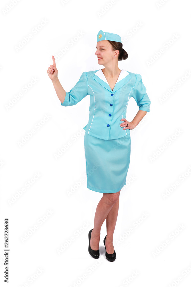 Charming and smiling stewardess wearing in the blue uniform. Isolated on white background Charming and smiling stewardess wearing in the blue uniform. Isolated on white background