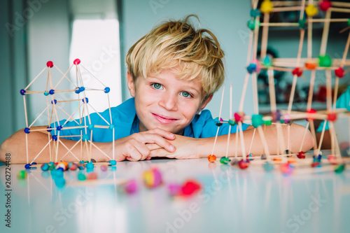 cute boy making geometric shapes, engineering and STEM