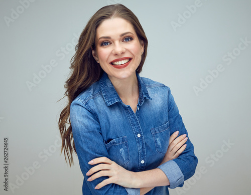 happy woman with long curly hair and toothy smie. photo