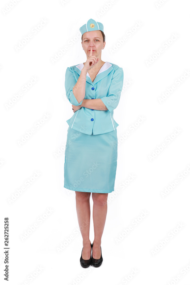 Stewardesse - Charming and smiling Stewardess Dressed In blue Uniform ask for silence and attention - Isolated on white background Stewardesse - Charming and smiling Stewardess Dressed In blue Uniform ask for silence and attention - Isolated on white background