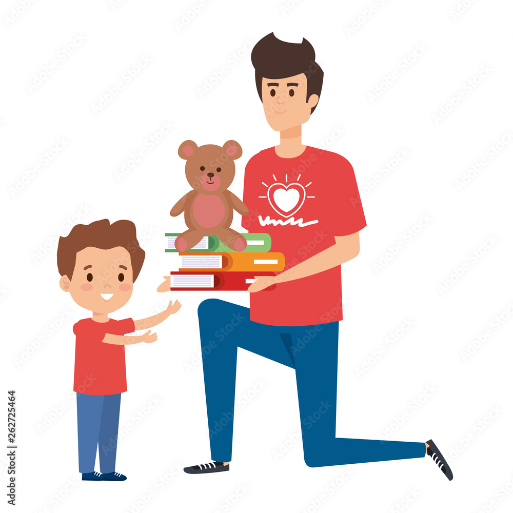 man volunteer giving a boy books and bear teddy man volunteer giving a boy books and bear teddy