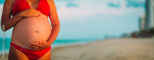 Happy pregnant woman at city beach vacation © nadezhda1906