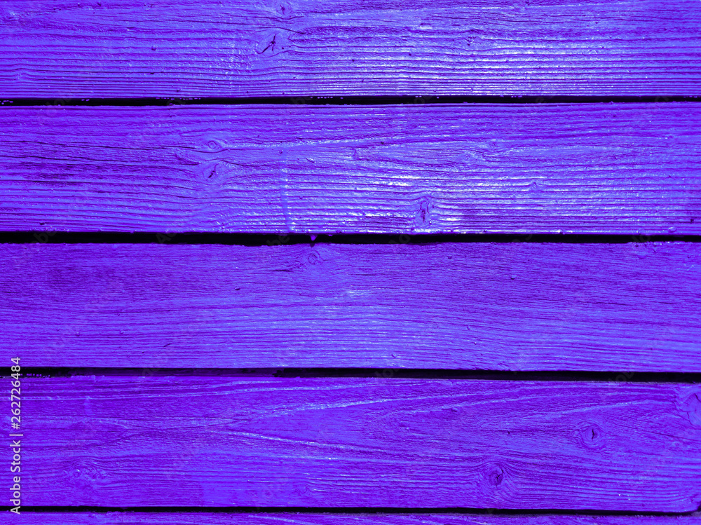 Painted in bright color boards on the fence. Painted in bright color boards on the fence.