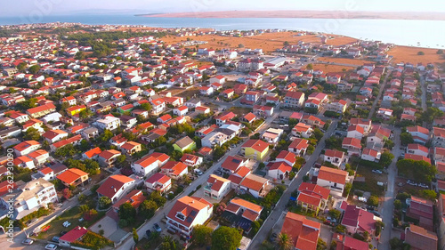 Aerial shot of apartments town at the sea