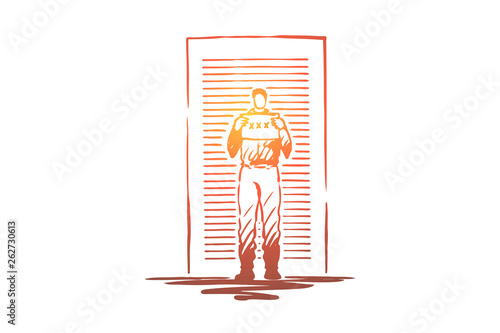 Prisoner mugshot, arrested man holding identification placard, faceless convict, outlaw standing by wall