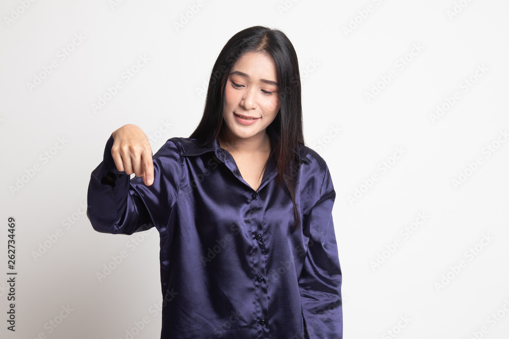 Beautiful young Asian woman point down to blank space. Beautiful young Asian woman point down to blank space.