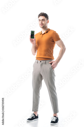handsome man holding smartphone with booking app on screen isolated on white