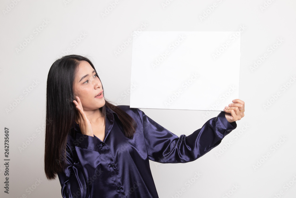 Young Asian woman surprise with white blank sign. Young Asian woman surprise with white blank sign.