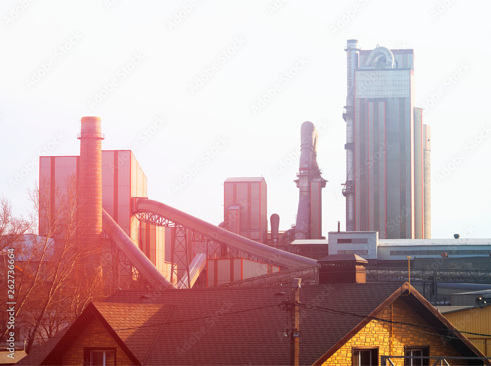 Sunset at cement factory industrial background
