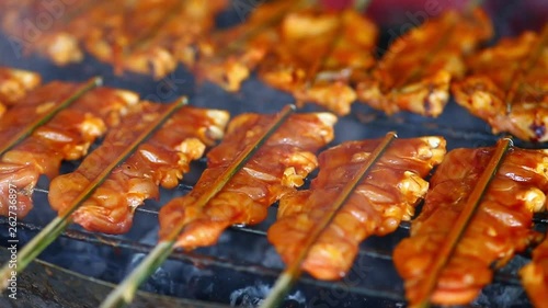 Street thai food, grilled chicken barbecue photo