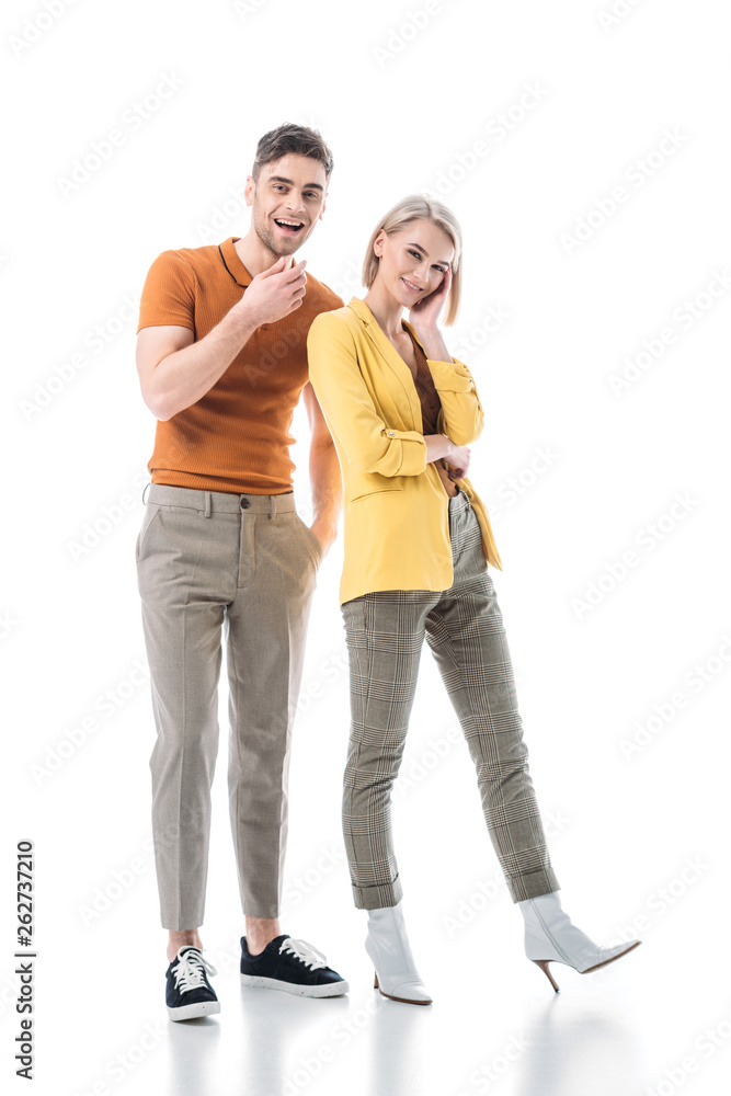 smiling young woman standing near smiling handsome man isolated on white smiling young woman standing near smiling handsome man isolated on white