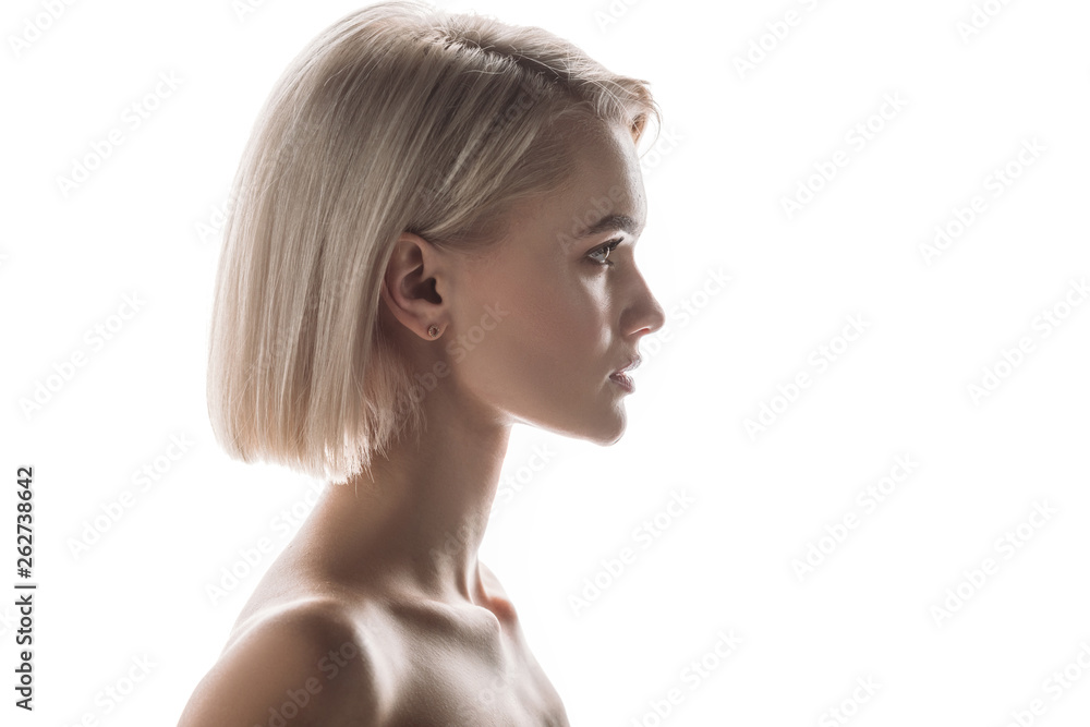 profile of attractive, nude confident woman isolated on grey profile of attractive, nude confident woman isolated on grey