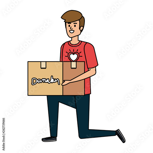 young man volunteer lifting donations box