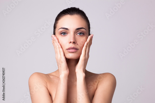 closeup portrait of beautyful woman with clean fresh skin