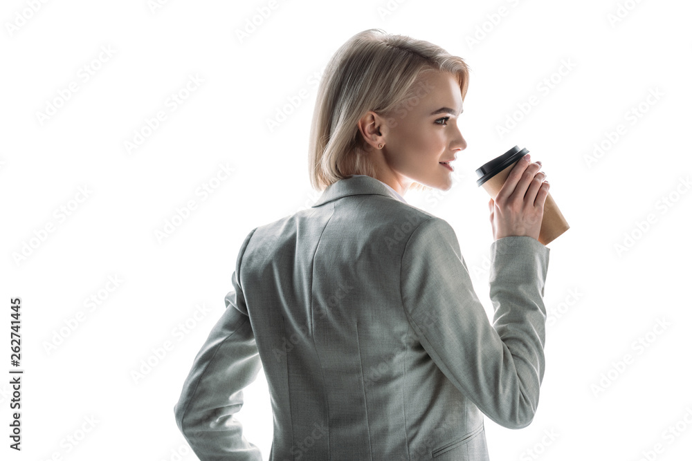 beautiful smiling businesswoman drinking coffee to go isolated on white