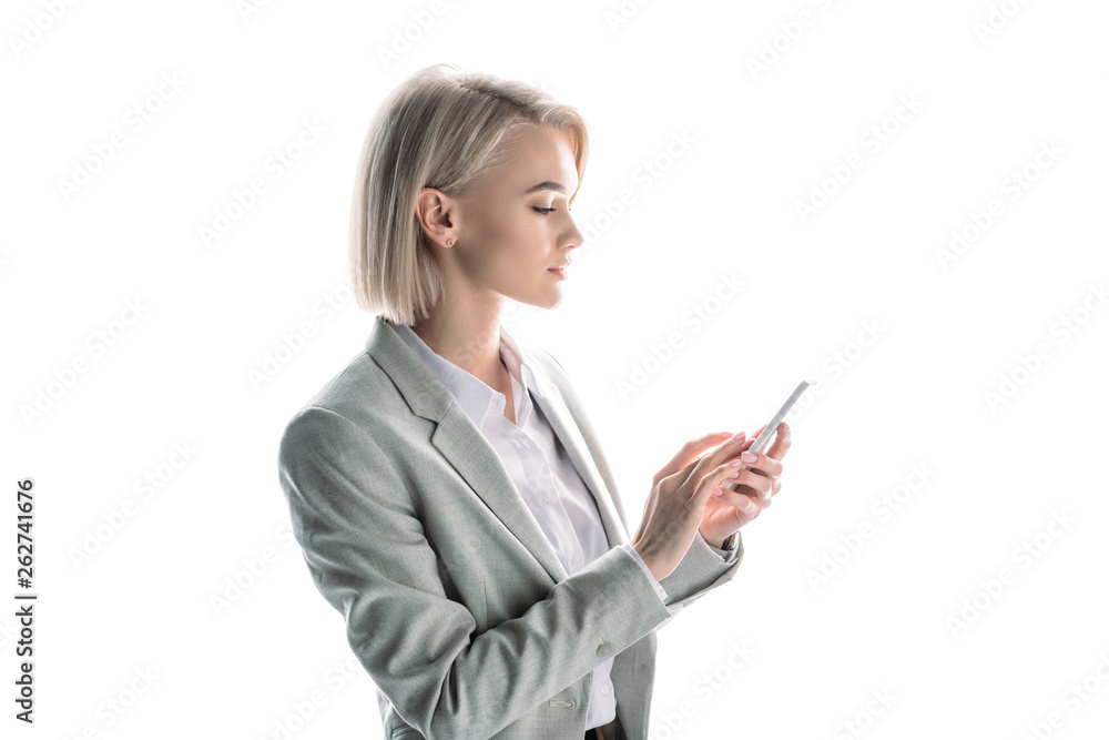 attractive businesswoman with blonde hair using smartphone isolated on white attractive businesswoman with blonde hair using smartphone isolated on white