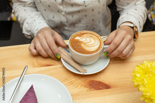 Woman dinner with cheessecake and coffee at restaurant photo