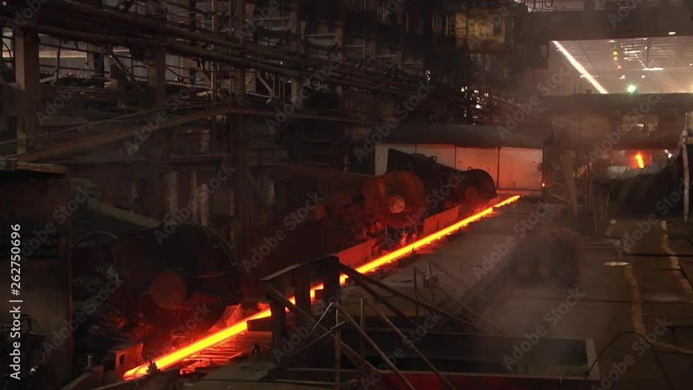 Steel Billets at Torch Cutting. Cutting machine for cutting hot rail. Metallurgical production. Steel Billets at Torch Cutting. Cutting machine for cutting hot rail. Metallurgical production.