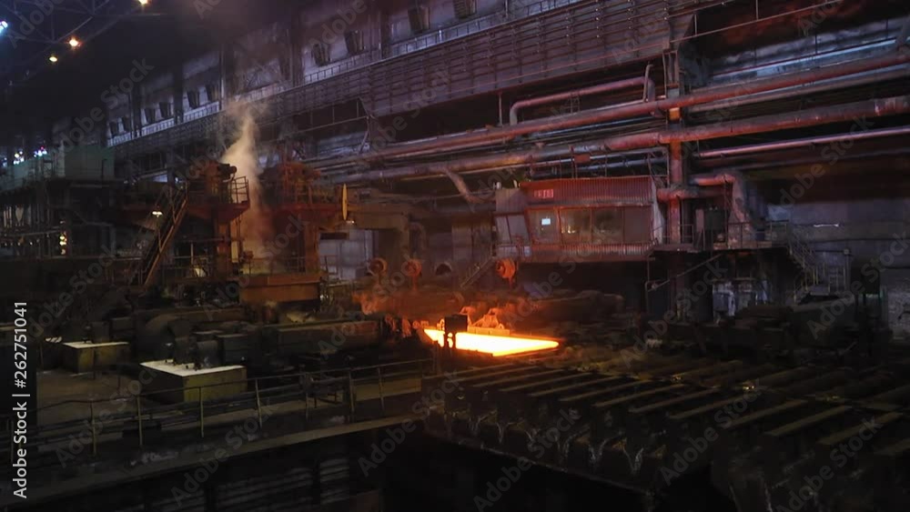 Steel plant, production of steel sheets, transportation of hot sheets on the production line, heavy industry, metal rolling plant. Conveyor line metal rolling mill. Steel plant, production of steel sheets, transportation of hot sheets on the production line, heavy industry, metal rolling plant. Conveyor line metal rolling mill.