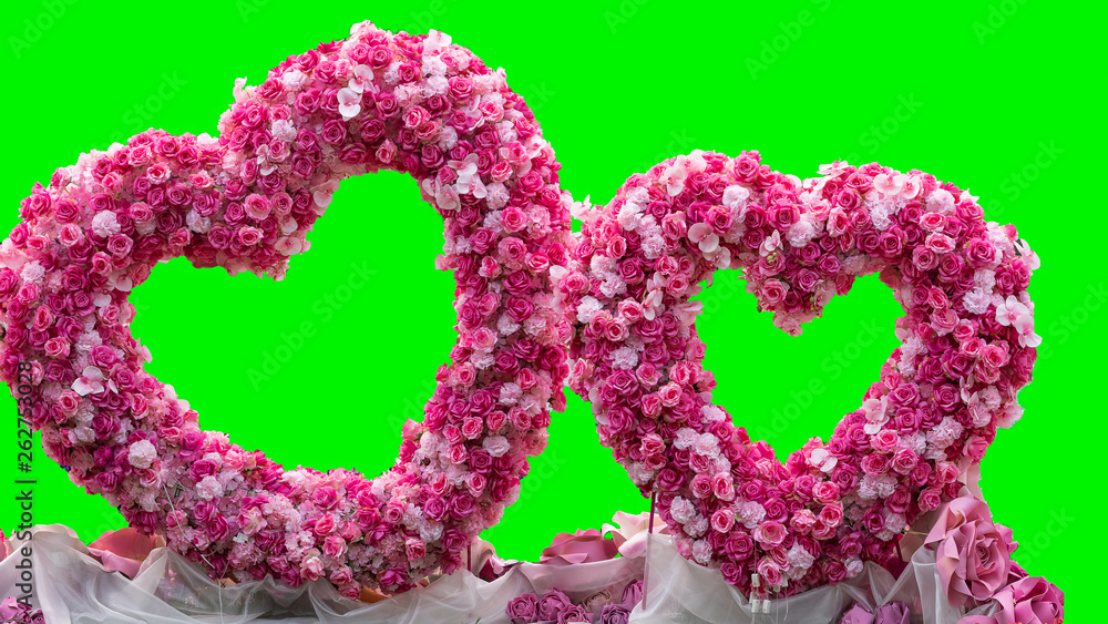 Heart shape made of green background flowers