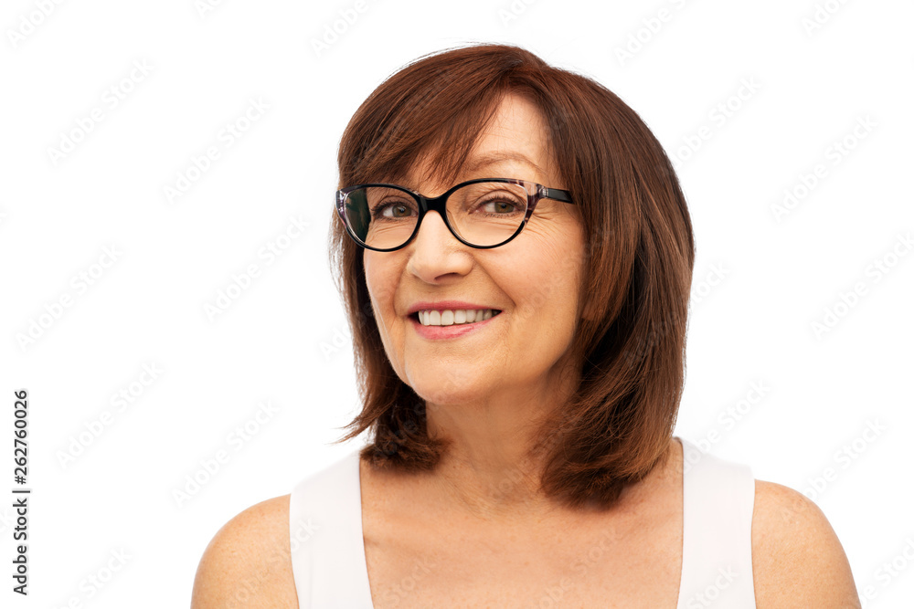 beauty, vision and old people concept - portrait of smiling senior woman in glasses over white background beauty, vision and old people concept - portrait of smiling senior woman in glasses over white background