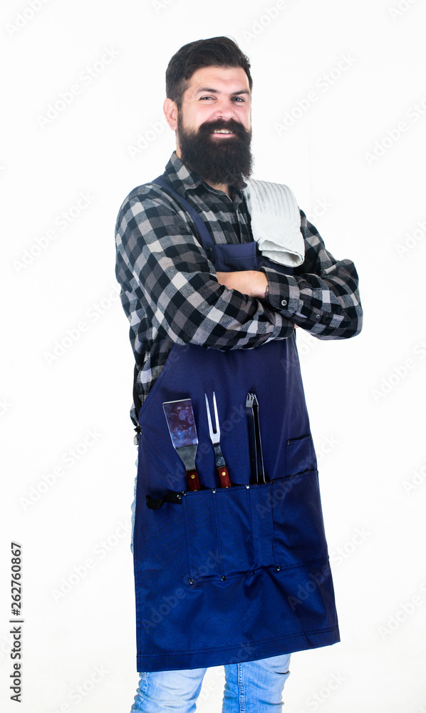 Skilled and confident. Grill master keeping his hand crossed with confidence. Master chef wearing grill apron with barbecue tools. Master of grill. BBQ master class at cooking school Skilled and confident. Grill master keeping his hand crossed with confidence. Master chef wearing grill apron with barbecue tools. Master of grill. BBQ master class at cooking school