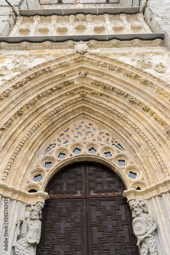 entrance with stone arch with reliefs, The Cathedral of Christ the Savior is a temple of catholic cult of the Spanish city of Ávila, episcopal headquarters of the same name, in Castile and Leon.