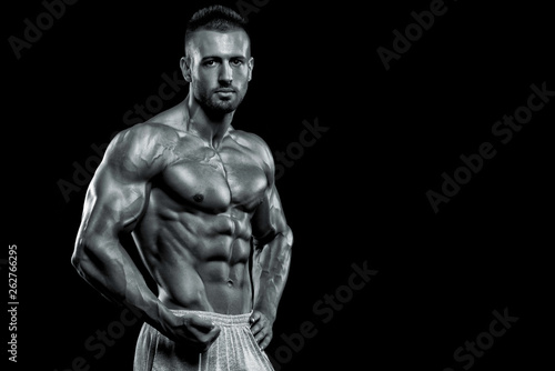 Strong Muscular Men Flexing Muscles © mrbigphoto