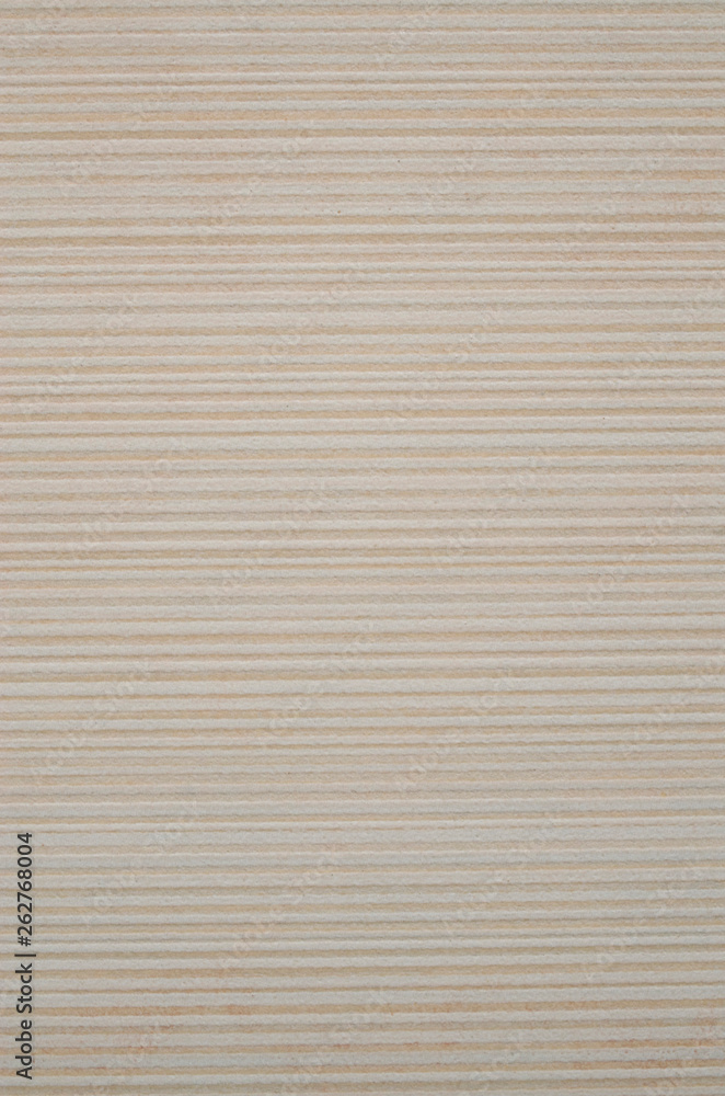 Ecru ceramic tile with horizontal lines on wall Ecru ceramic tile with horizontal lines on wall
