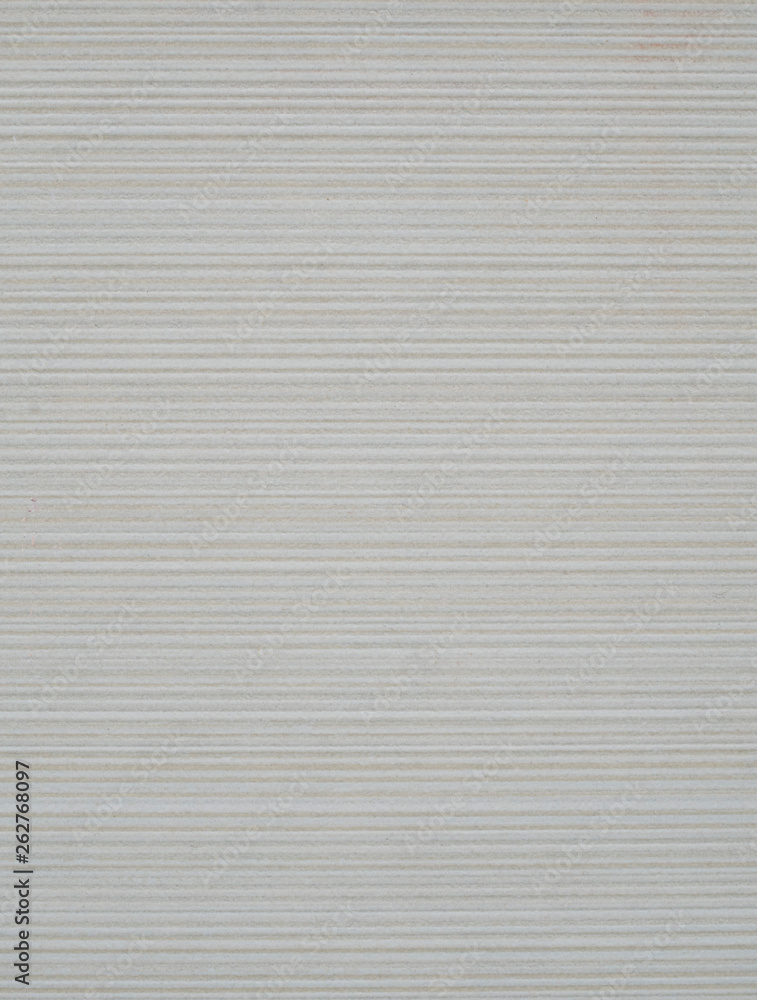 Ecru ceramic tile with horizontal lines on wall Ecru ceramic tile with horizontal lines on wall