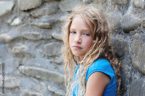 Sad child outdoors © Tatyana Gladskih