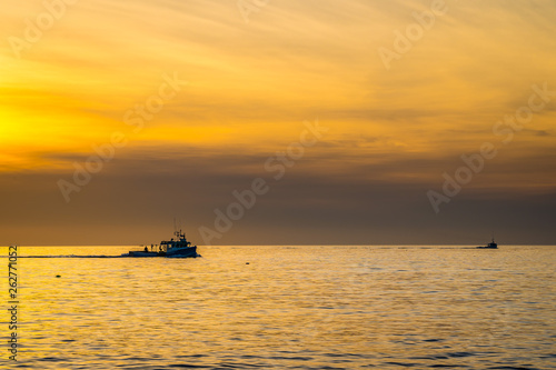Beautiful Atlantic coastal shoreline scenery of lighthouses and lobster boats. © DerekP