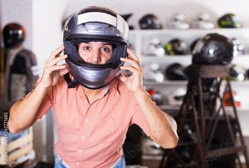 Man trying up moto helmet