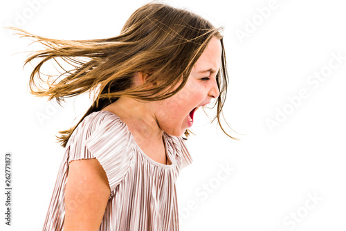 Fényképezés Little girl child yelling, shouting and screaming with bad manners
