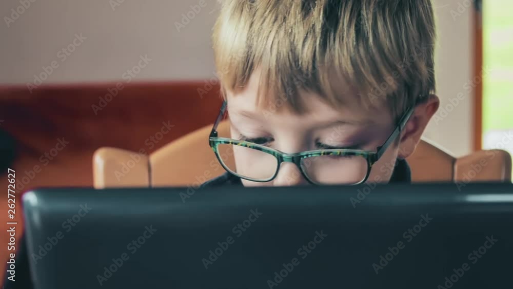 Child working on computer Child working on computer