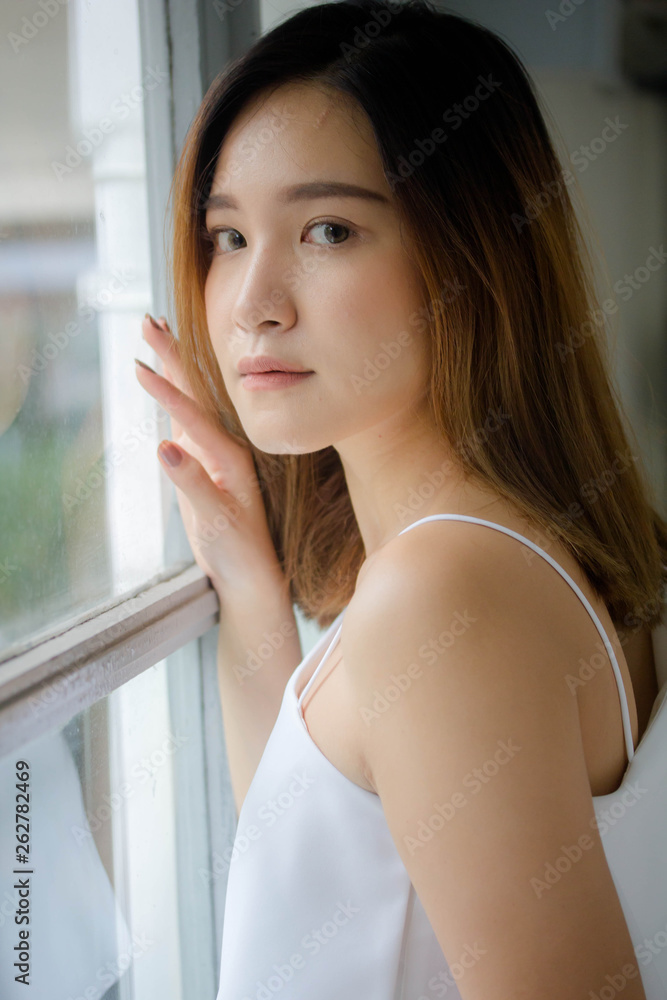 Portrait of thai adult beautiful girl relax and smile Portrait of thai adult beautiful girl relax and smile
