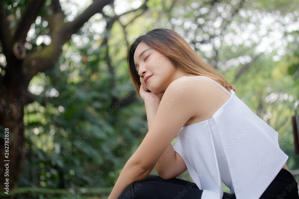 Portrait of thai adult beautiful girl relax and smile Portrait of thai adult beautiful girl relax and smile