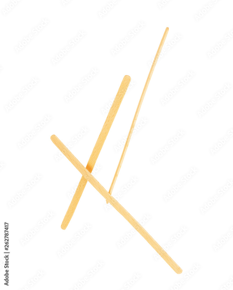 Wooden stick stirrers sticks on an isolated white background Wooden stick stirrers sticks on an isolated white background